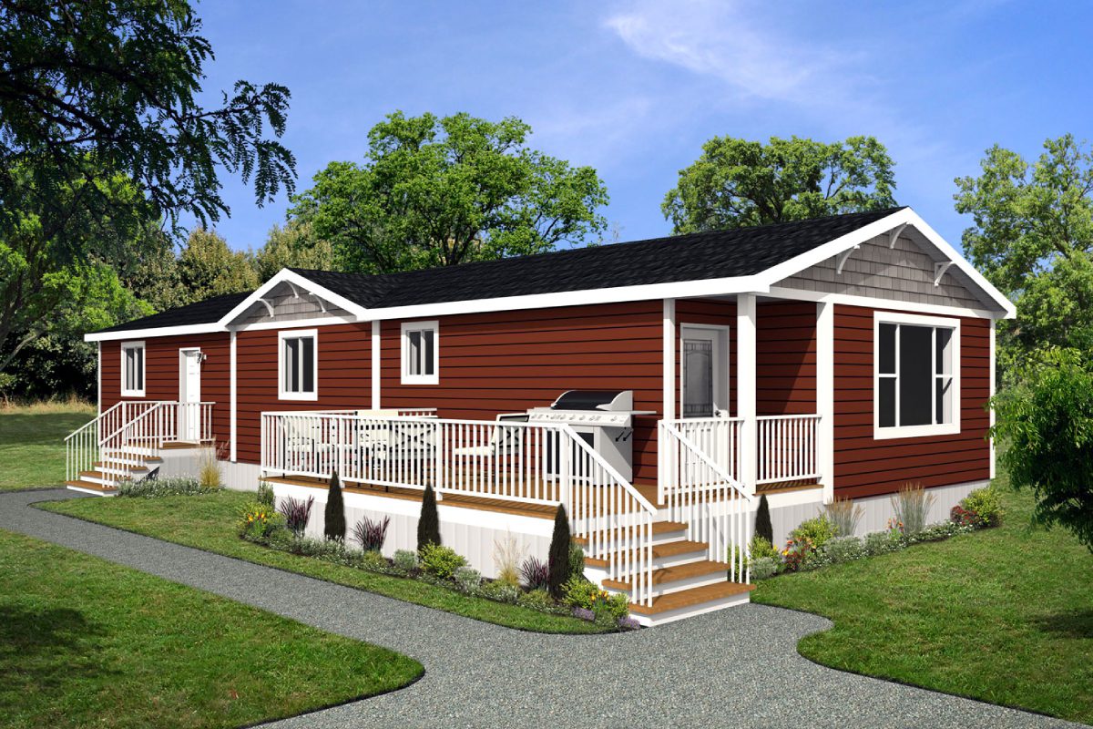 Red modular home with porch and trees.