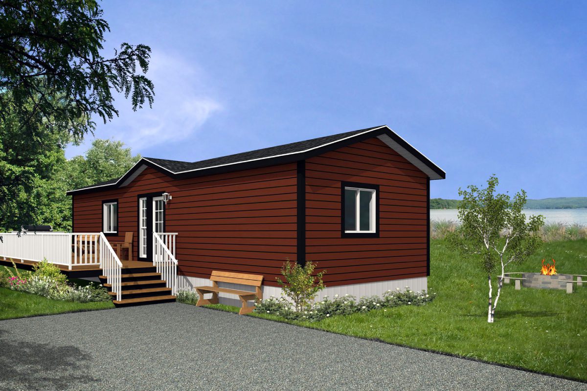 Red house with deck in green yard.