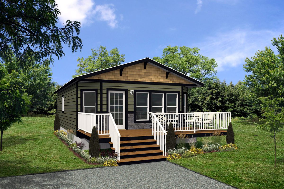 Small house with porch and surrounding trees.