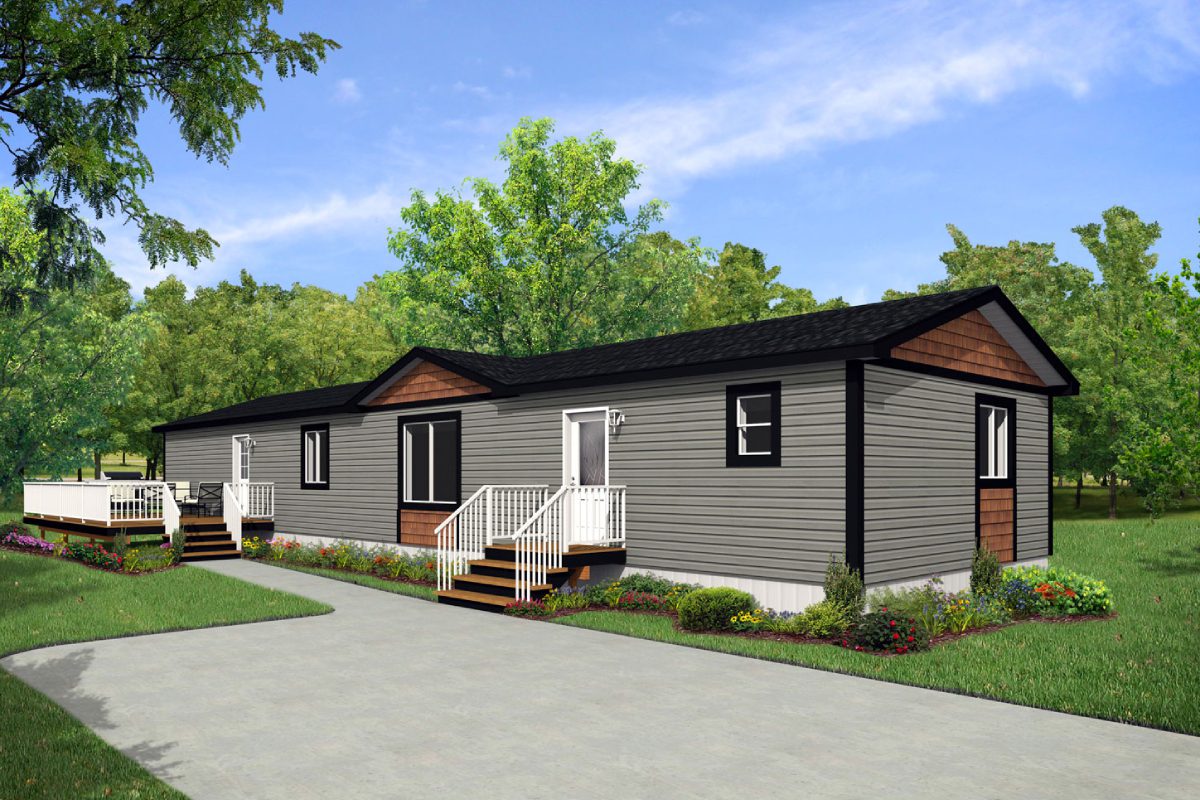 Grey mobile home with a landscaped yard.