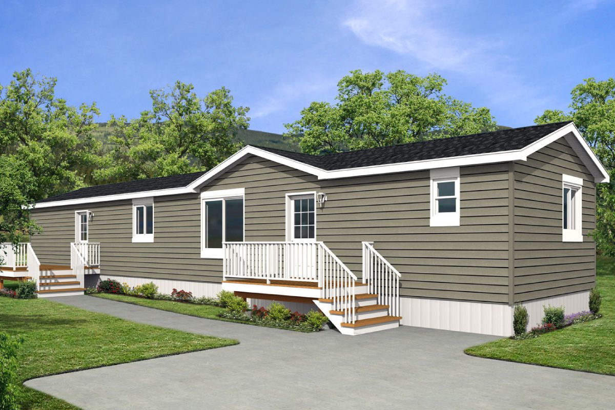 Manufactured home with steps and greenery.