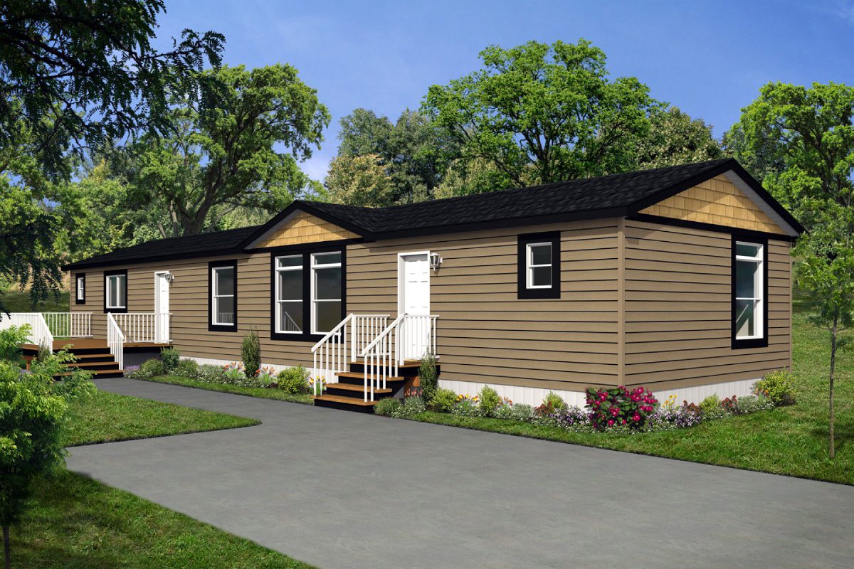 Modern mobile home with landscaped surroundings.